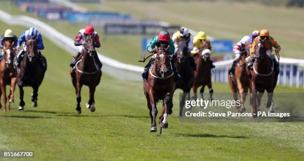 Maputo ridden by Graham Lee wins the Boylesports.com Download Our App Handicap Stakes during Boylesport Ladies Day of the Piper-Heidsieck July...