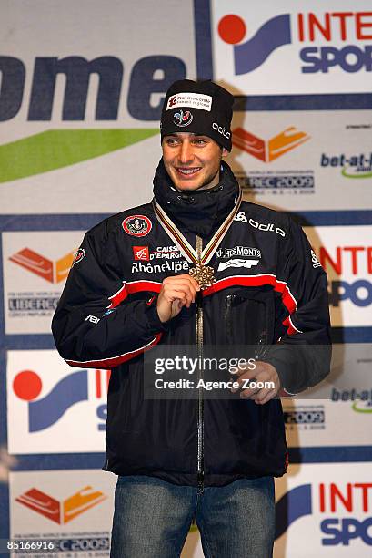 Jason Lamy Chappuis of France celebrates on the podium with his bronze medal after the FIS Nordic World Championships Gundersen LH HS134/10Km event...