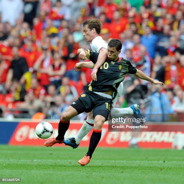 Scott Parker of England and Eden Hazard of Belgium in action during the international friendly match between England and Belgium at Wembley Stadium...