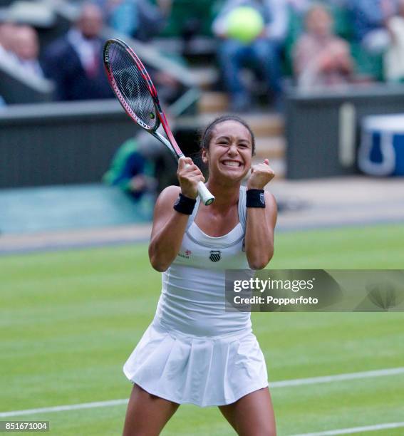 Heather Watson of Great Britain celebrates after winning her women's singles first round match against Iveta Benesova of the Czech Republic on Day...