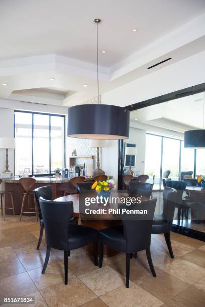 Magician Penn Jillette's home is photographed for Closer Weekly Magazine on June 15, 2016 at home in Nevada. Dining table.