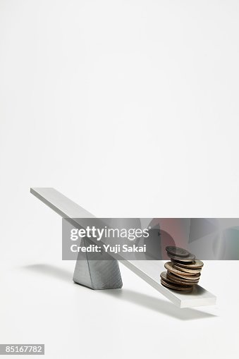 Coins on the seesaw Coins on the seesaw