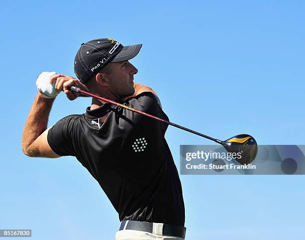 Geoff Ogilvy of Australia plays his tee shot on the eighth hole during the final round of Accenture Match Play Championships at Ritz - Carlton Golf...