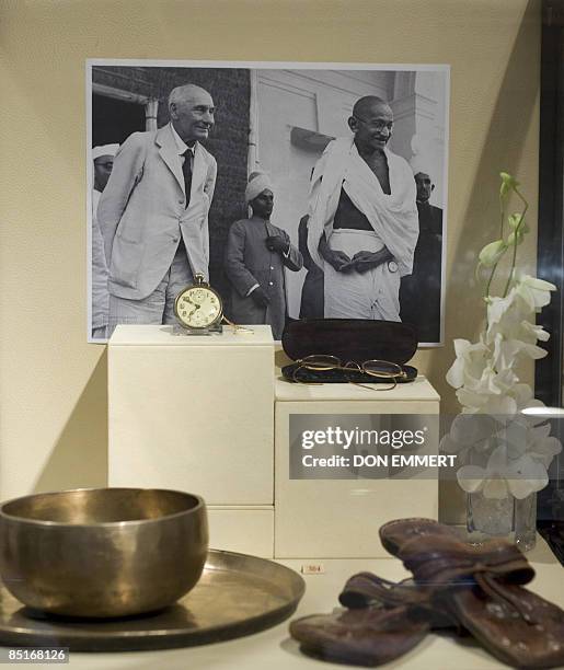 Mahatma Gandhi's round glasses, his watch, his plate and bowl and his sandals at the auction house Sunday.March 1, 2009 in New York. The sale of the...