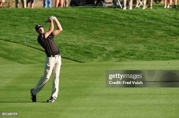 World Match Play Championship: Geoff Ogilvy hitting second shot on 7th hole on Sunday at Ritz-Carlton GC of Dove Mountain. Marana, AZ 3/1/2009...