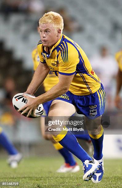 Kris Keating of the Eels runs the ball during the NRL Trial match between the Parramatta Eels and the Sydney Roosters at Campbelltown Sports Stadium...