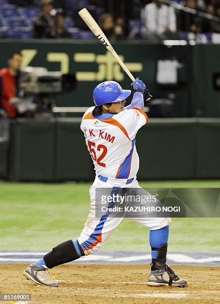 South Korean infielder Kim Tae-Kyun hits a two-run home run in the third inning against Japan's Seibu Lions during their exhibition game ahead of the...