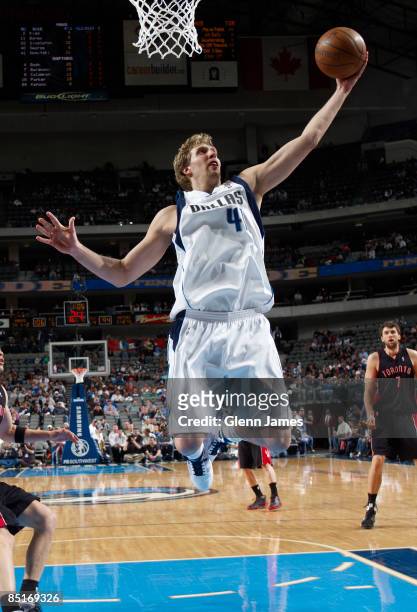 Dirk Nowitzki of the Dallas Mavericks goes up for the rebound against the Toronto Raptors on March 1, 2009 at the American Airlines Center in Dallas,...