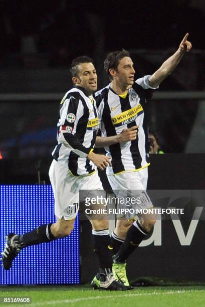 Juventus' Claudio Marchisio celebrates with teammate Alex Del Piero after scoring against Napoli during their Series A football match at Turin's...