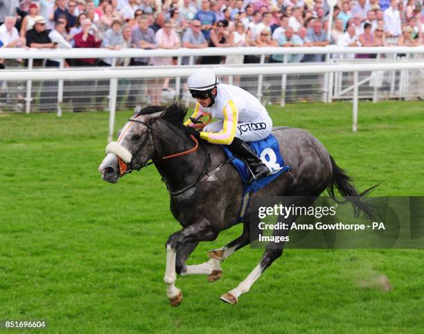 The Grey Gatsby ridden by Graham Lee wins the John Smith's Median Auction Stakes during the 2013 John Smith's Cup Meeting at York Racecourse, York.