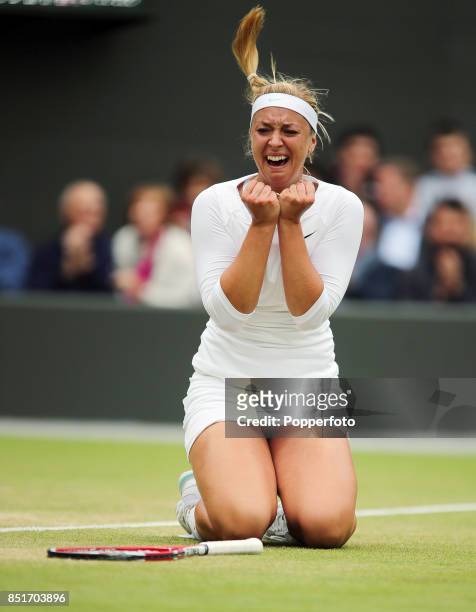 Sabine Lisicki of Germany celebrates after winning her Ladies' singles fourth round match against Maria Sharapova of Russia on Day Seven of the...