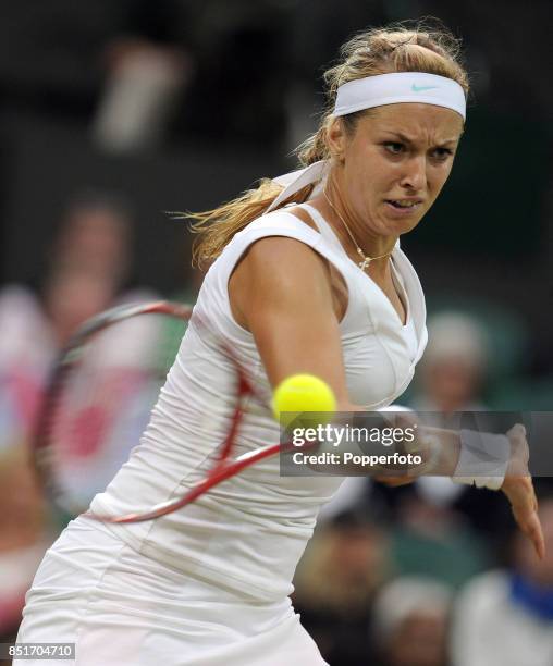 Sabine Lisicki of Germany in action during her Ladies' Singles quarter-final match against Angelique Kerber of Germany on Day Eight of the Wimbledon...