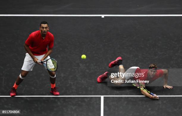 Jack Sock of Team World hits a volley playing with Nick Kyrgios during there doubles match against Tomas Berdych and Rafael Nadal of Team Europe on...