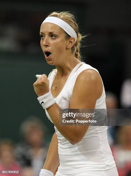 Sabine Lisicki of Germany reacts during her Ladies' Singles quarter-final match against Angelique Kerber of Germany on Day Eight of the Wimbledon...