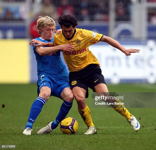 Andreas Beck of Hoffenheim challenges Nelson Valdez of Dortmund during the Bundesliga match between Borussia Dortmund and 1899 Hoffenheim at the...