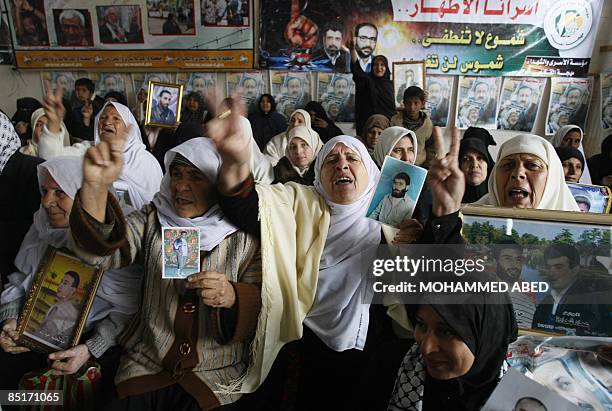 Palestinian women attend a sit in at the Red Cross offices in Gaza City calling for the release of Palestinian prisoners held in Israeli jails on...