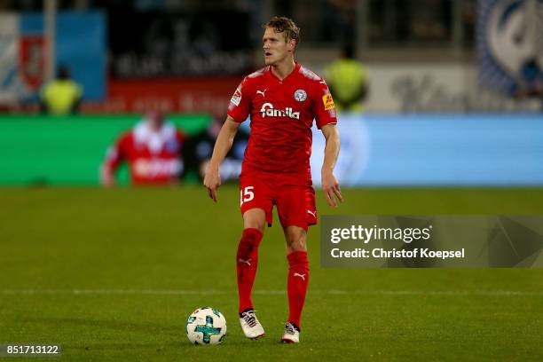 Johannes van den Bergh of Kiel runs with the ball during the Second Bundesliga match between MSV Duisburg and Holstein Kiel at...