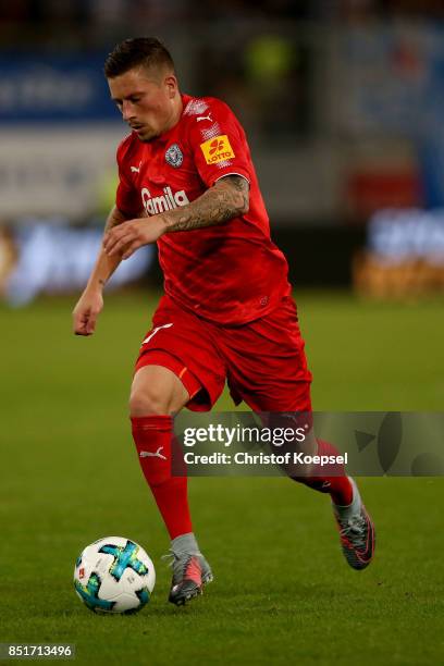 Steven Lewerenz of Kiel runs with the ball during the Second Bundesliga match between MSV Duisburg and Holstein Kiel at Schauinsland-Reisen-Arena on...