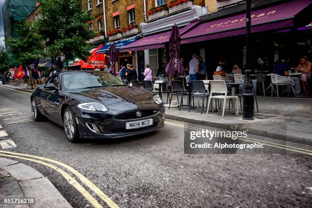 jaguar xk in london - air intake shaft stock pictures, royalty-free photos & images