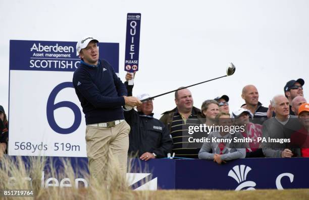 Martin Laird tees off at the 6th hole during day four of the Aberdeen Asset Management Scottish Open at Castle Stuart Golf Course, Inverness.