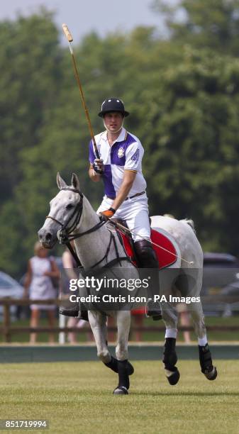 The Duke of Cambridge in action during The Jerudong Trophy at Cirencester Park Polo Club in Cirencester, Gloucestershire.