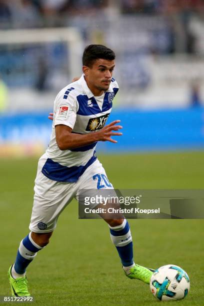 Pauly Oliveira Souzaof Duisburg runs with the ball during the Second Bundesliga match between MSV Duisburg and Holstein Kiel at...