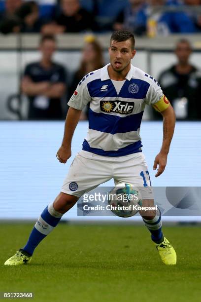 Kevin Wolze of Duisburg runs with the ball during the Second Bundesliga match between MSV Duisburg and Holstein Kiel at Schauinsland-Reisen-Arena on...