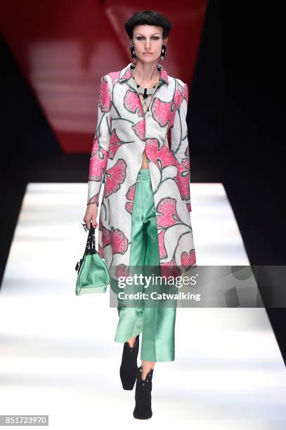 Model walks the runway at the Giorgio Armani Spring Summer 2018 fashion show during Milan Fashion Week on September 22, 2017 in Milan, Italy.