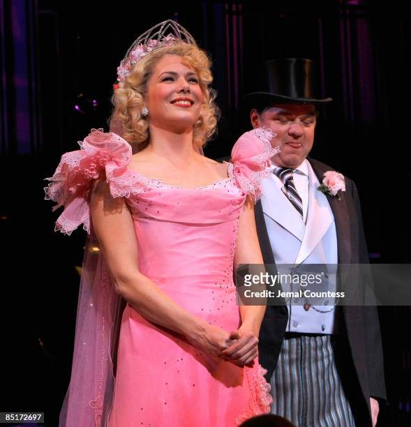 Actors Lauren Graham and Oliver Platt take a bow during curatin call at the opening night of "Guys & Dolls" on Broadway at the Nederlander Theatre on...
