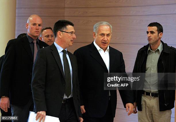 Israeli Likud party leader and former prime minister Benjamin Netanyahu arrives for a party meeting in the Knesset in Jerusalem on March 02, 2009....