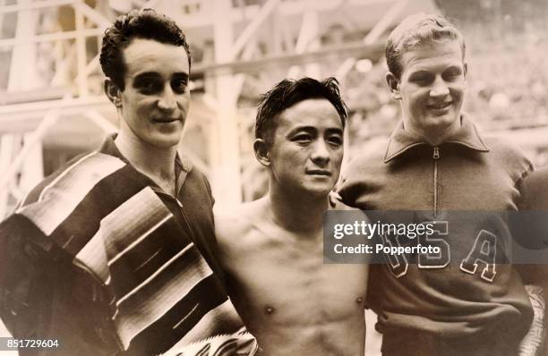 Left to right; Mike Capilla of Mexico Sammy Lee of the USA and Bruce Harlan of the USA , medallists in the men's 10 metre platform diving competition...