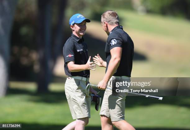 Callum Gaughan and Scott McGovern of Normanton Golf Club celebrate making a birdie on the 17th green during The Lombard Trophy Final - Day Two on...