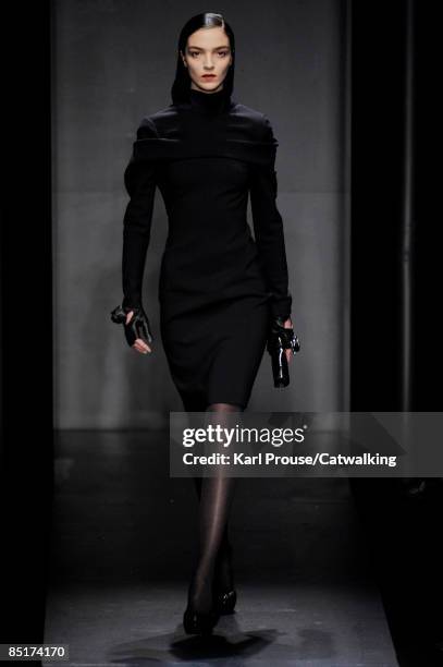 Model walks the runway at the Salvatore Ferragamo fashion show during Milan Fashion Week Womenswear Autumn/Winter 2009 on March 1, 2009 in Milan,...