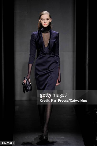 Model walks the runway at the Salvatore Ferragamo fashion show during Milan Fashion Week Womenswear Autumn/Winter 2009 on March 1, 2009 in Milan,...