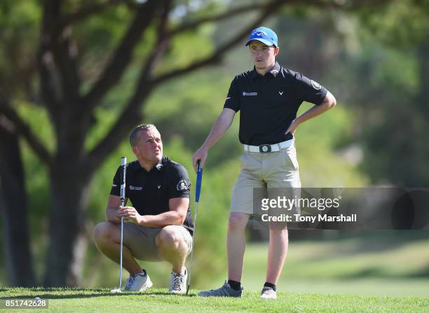 Scott McGovern and Callum Gaughan of Normanton Golf Club line up a putt on the 1st play off hole during The Lombard Trophy Final - Day Two on...