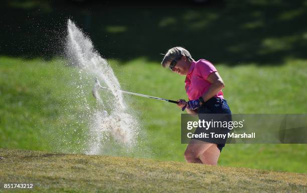 Anne Curwen of Nene Park Golf Club plays out of a bunker on the 18th green during The WPGA Lombard Trophy Final - Day Two on September 22, 2017 in...