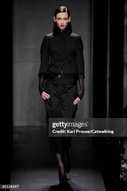 Model walks the runway at the Salvatore Ferragamo fashion show during Milan Fashion Week Womenswear Autumn/Winter 2009 on March 1, 2009 in Milan,...