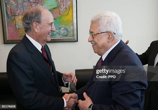 In this handout image provided by the Palestinian Press Office , Palestinian President Mahmoud Abbas meets with George J Mitchell, US president's...