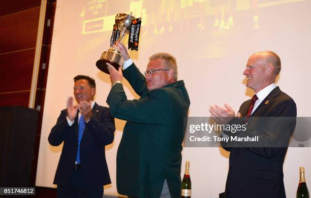 Ian Issac of Lombard and John Heggarty, Captain of PGA present Lombard Trophy to Andrew Picton of Hart Common Golf Club during The Lombard Trophy...