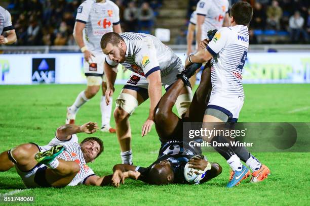 Lester Etien of Massy is tackled by the opposition defence during the French Pro D2 match between Massy and Colomiers on September 22, 2017 in Massy,...