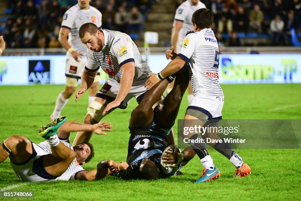 Lester Etien of Massy is tackled by the opposition defence during the French Pro D2 match between Massy and Colomiers on September 22, 2017 in Massy,...