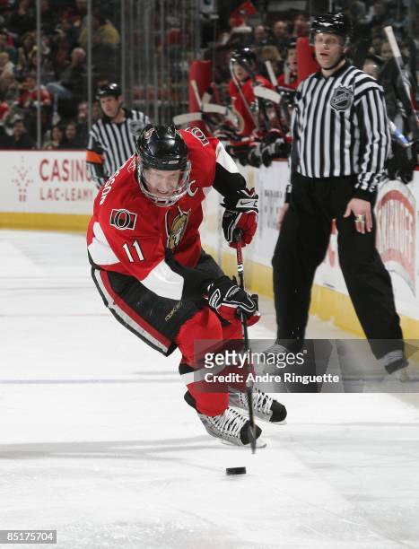 Daniel Alfredsson of the Ottawa Senators skates against the San Jose Sharks at Scotiabank Place on February 26, 2009 in Ottawa, Ontario, Canada.