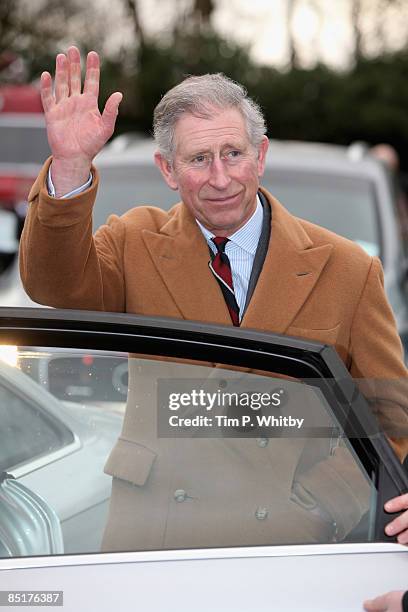 Prince Charles, Prince of Wales waves goodbye after visiting Froncysyllte, winner of the Calor Gas Village of the Year, on March 2, 2009 near Clwyd...