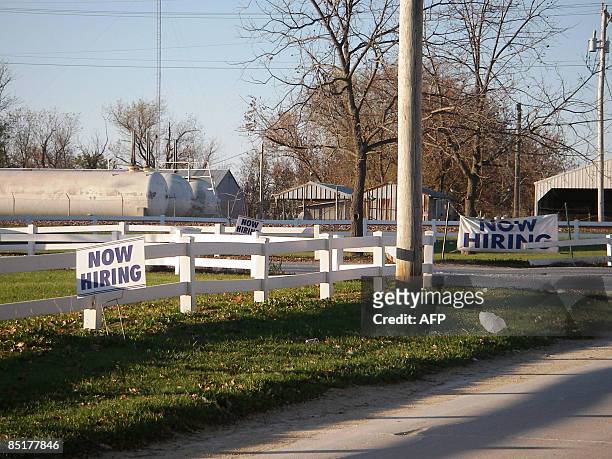 By Olivia Hampton Signs looking for workers are seen in Postville,Iowa. After bringing workers from homeless shelters in Texas and large inner-city...