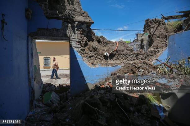 Man walks in the streets of Jojutla three days after the magnitude 7.1 earthquake jolted central Mexico killing more than 250 hundred people,...