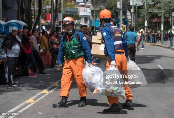 Group of Japanese rescuers assist in rescue work three days after the magnitude 7.1 earthquake jolted central Mexico killing more than 250 hundred...