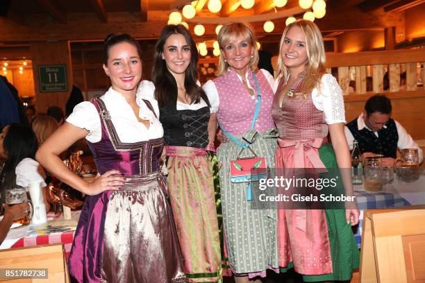 Christa Kinshofer with her daughter Stephanie , step daughter Laura Rembeck and daughter Alexandra Kinshofer during the Oktoberfest at Schuetzen...