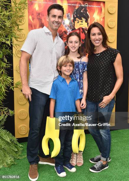 Swimmer Janet Evans and family arrive at the premiere of 'The LEGO Ninjago Movie' at Regency Village Theatre on September 16, 2017 in Westwood,...