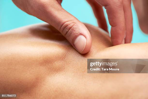 hand touching skin - man skin care stock pictures, royalty-free photos & images