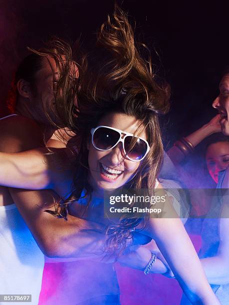 portrait of woman body surfing - crowd surfing stock pictures, royalty-free photos & images